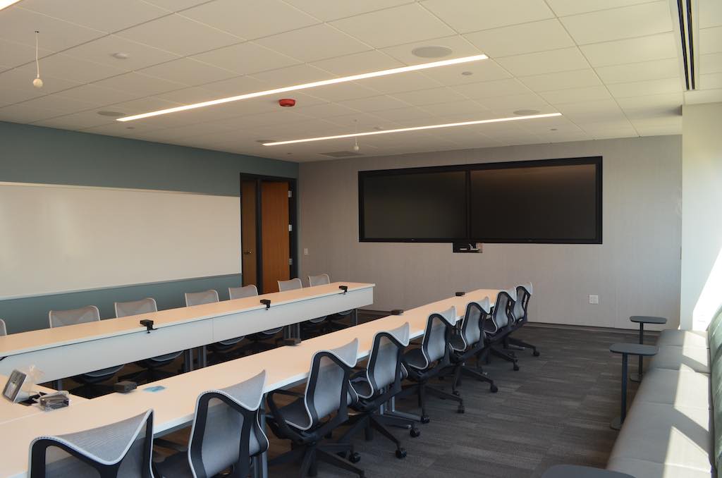 Figure 1: Install example showing wall controls and combination occupancy sensor/photocell. Courtesy: SmithGroup