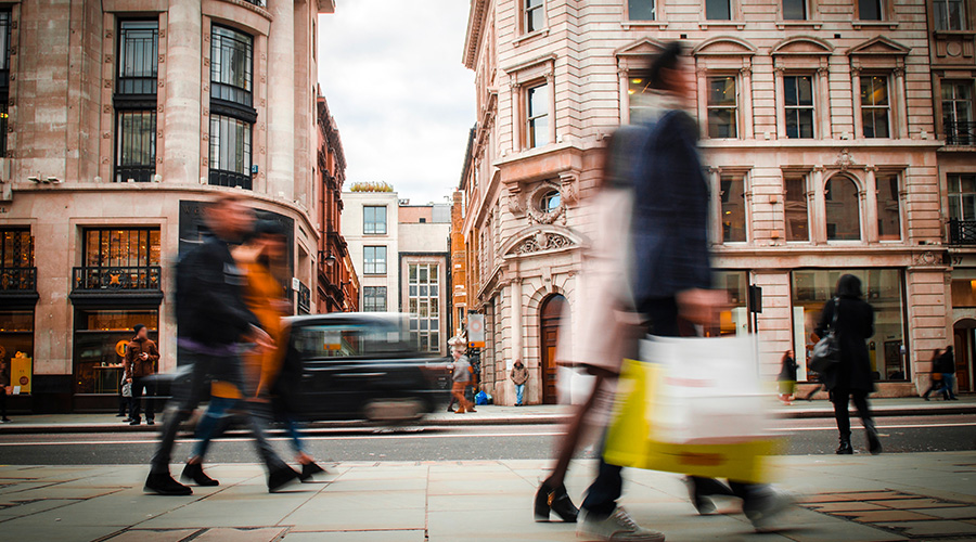 shoppers walking on street